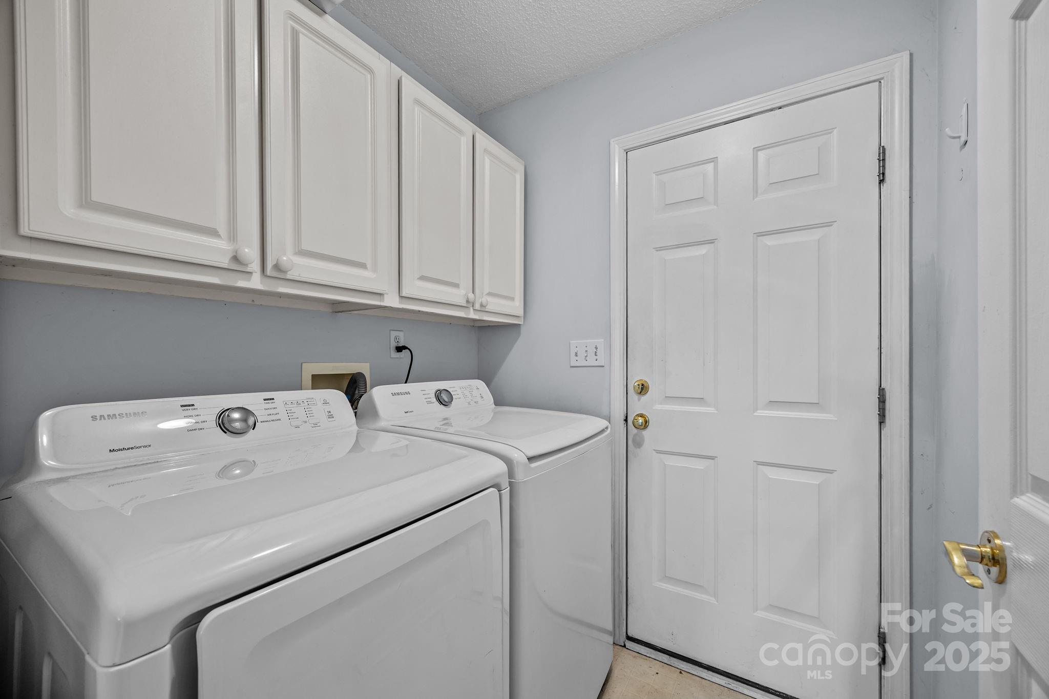 255 Stonehollow Road Fletcher, NC 28732 - Photo 24 of 32 a utility room with dryer and washer