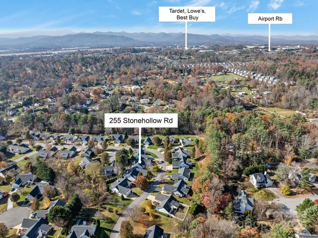 a view of a city with lots of trees