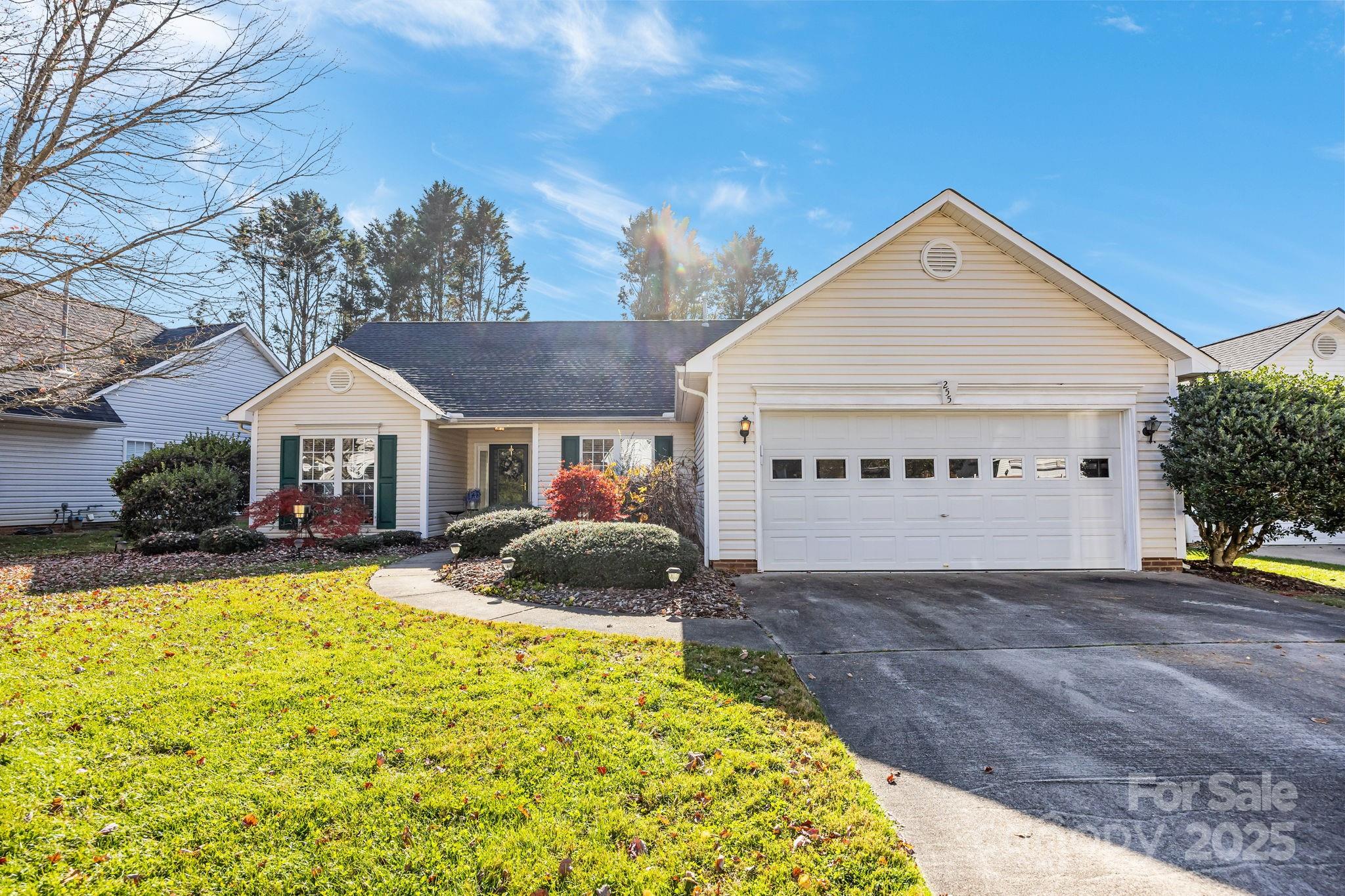 255 Stonehollow Road Fletcher, NC 28732 - Photo 27 of 32 a view of a house with backyard and sitting area