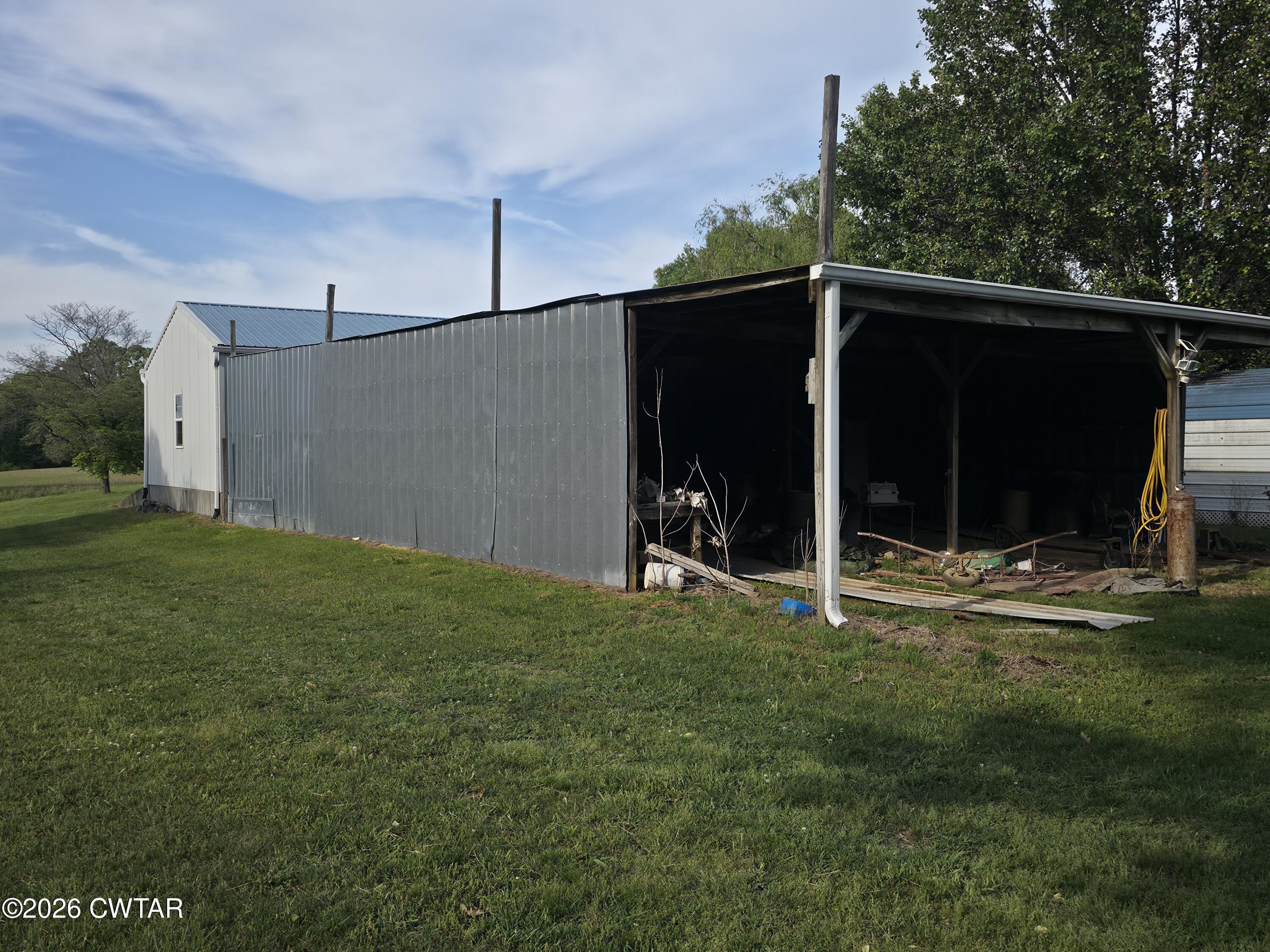 111 Leighton County Line Road Denmark, TN 38391 - Photo 15 of 53 a view of a two room next to a yard