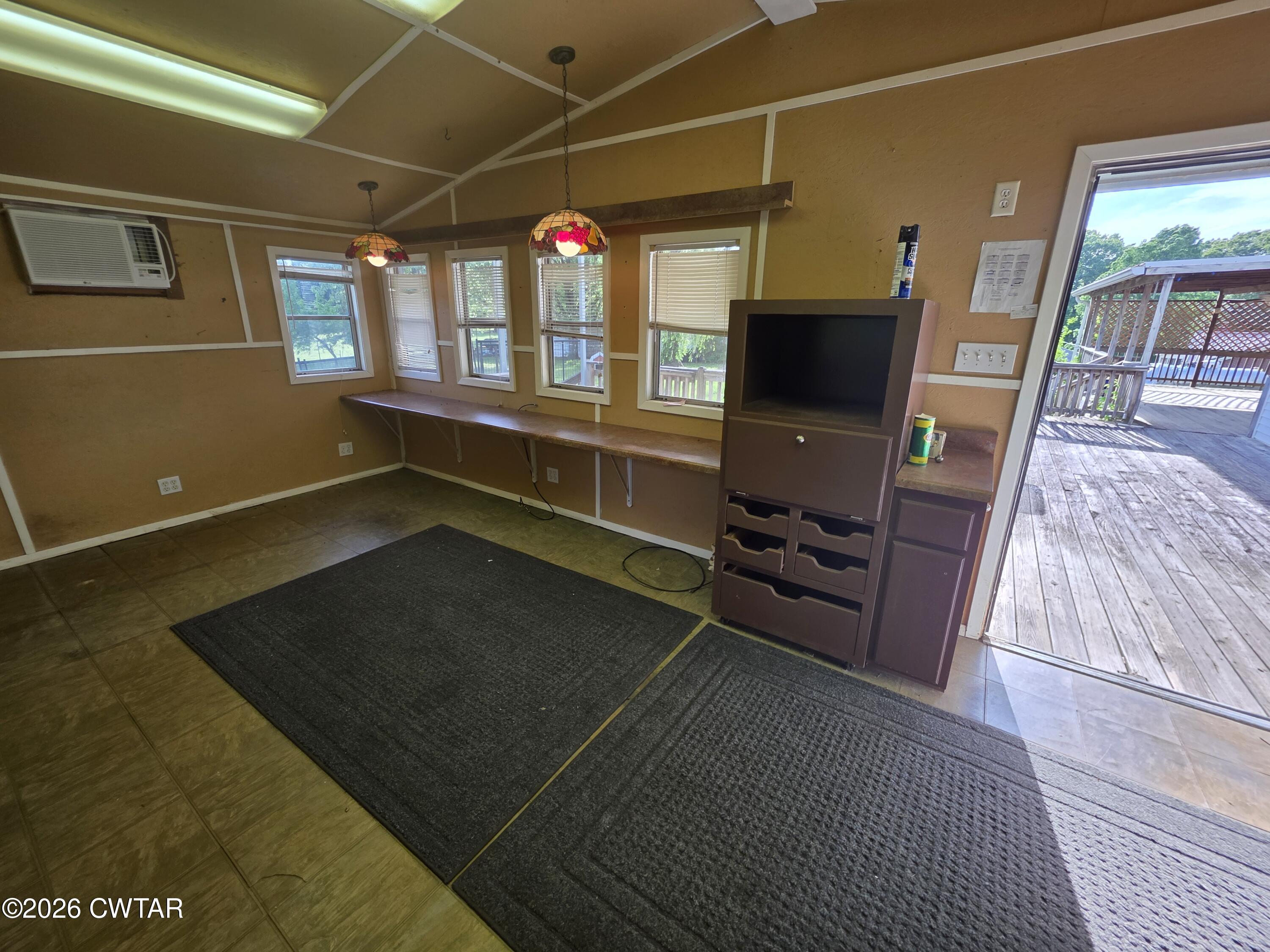 111 Leighton County Line Road Denmark, TN 38391 - Photo 27 of 53 a living room with furniture and a flat screen tv