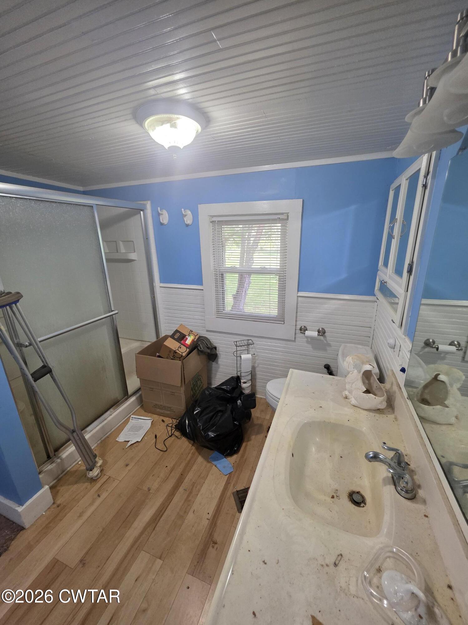 111 Leighton County Line Road Denmark, TN 38391 - Photo 34 of 53 a bedroom with a bed and a dresser