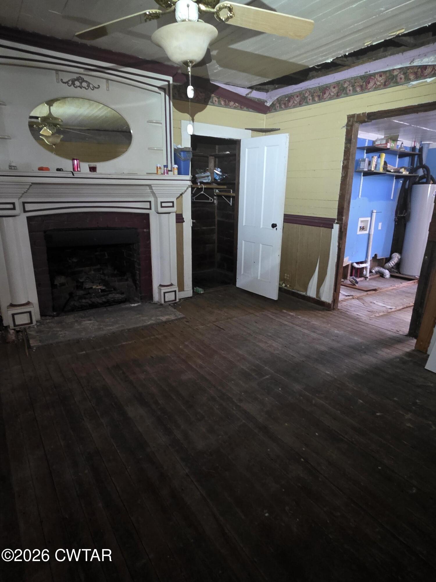111 Leighton County Line Road Denmark, TN 38391 - Photo 36 of 53 a view of a livingroom with a fireplace