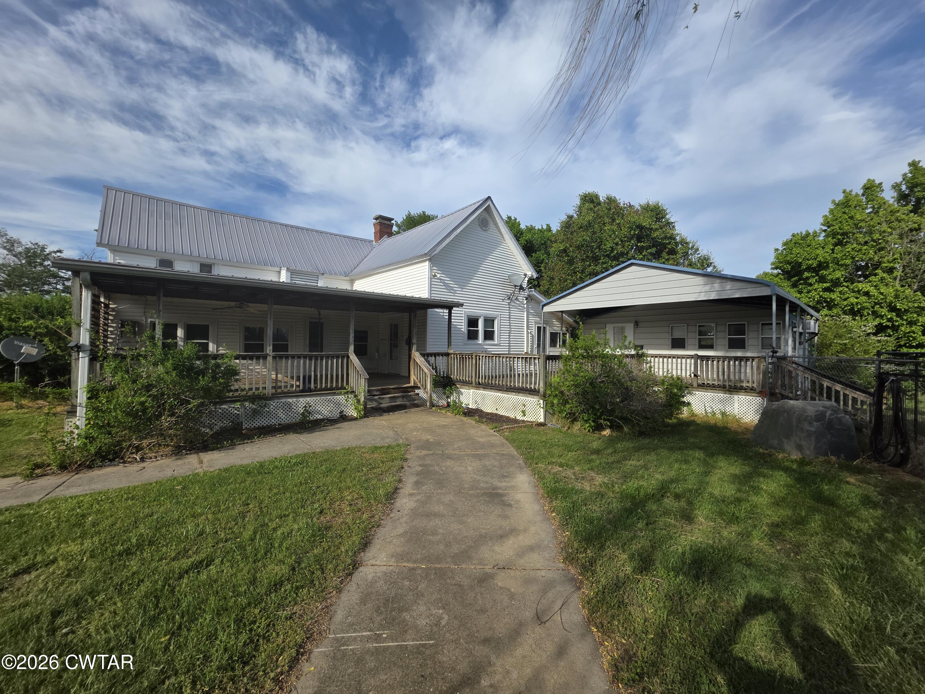111 Leighton County Line Road Denmark, TN 38391 - Photo 4 of 53 a front view of a house with garden