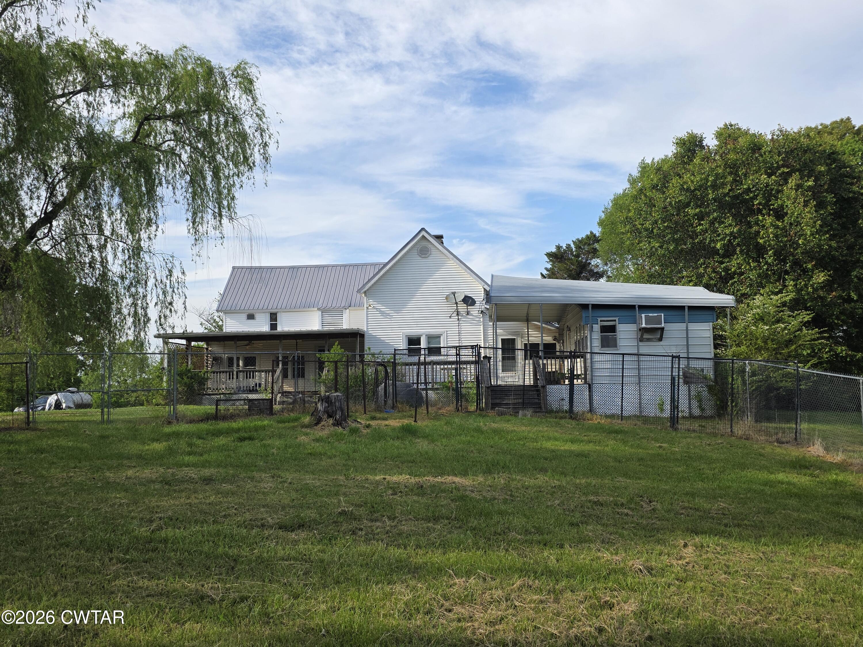 111 Leighton County Line Road Denmark, TN 38391 - Photo 5 of 53 a view of a house with a yard and sitting area