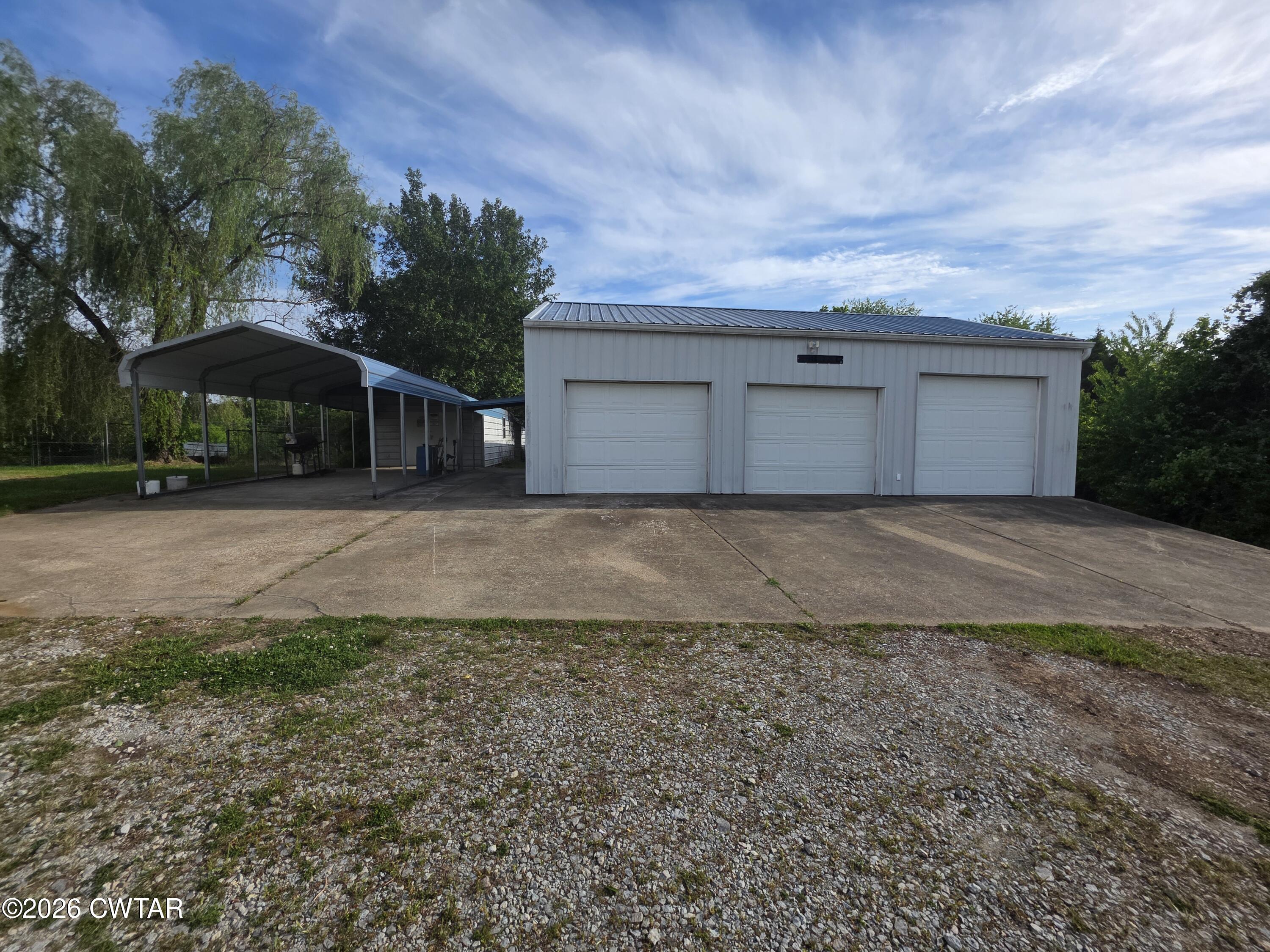 111 Leighton County Line Road Denmark, TN 38391 - Photo 7 of 53 a view of a house with a yard and large tree