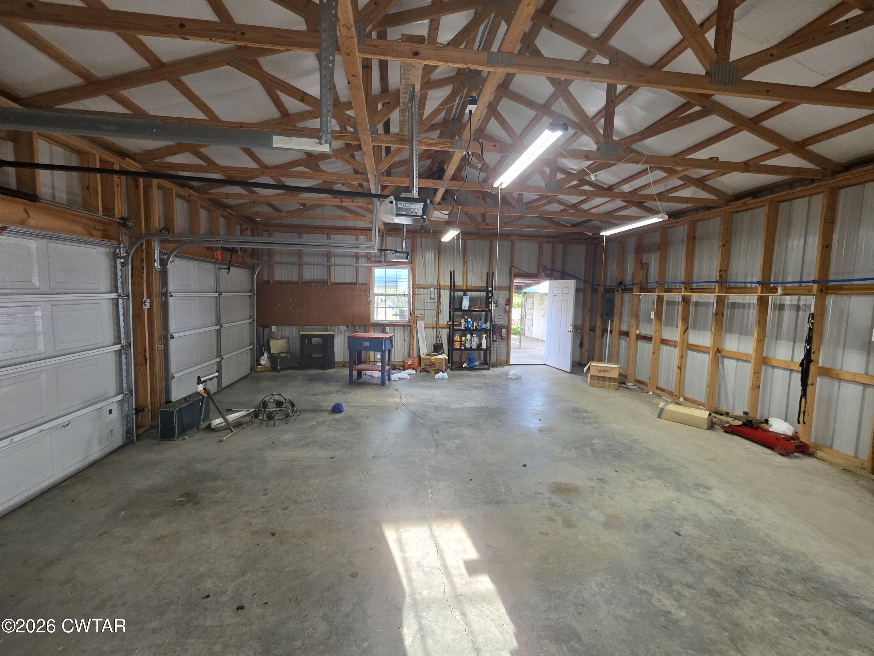 111 Leighton County Line Road Denmark, TN 38391 - Photo 9 of 53 a view of empty room with wooden ceiling