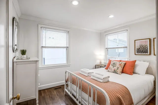 a bed room with a bed and furniture