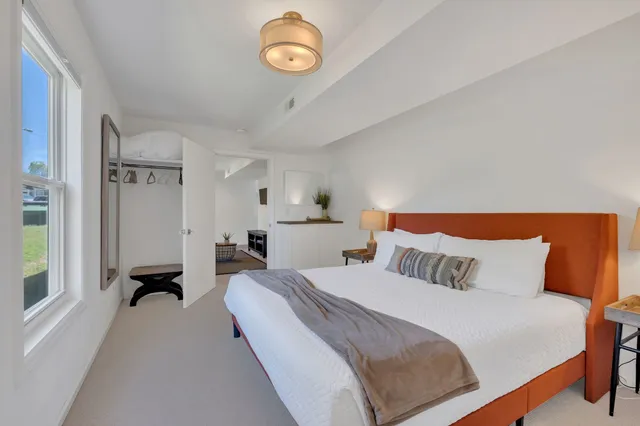 a view of a livingroom with furniture and window