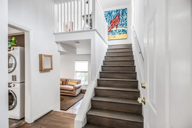 a bathroom with a toilet sink and shower