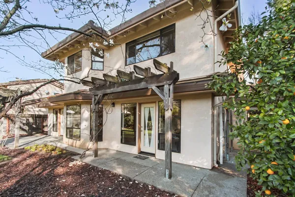 a front view of a house with swimming pool
