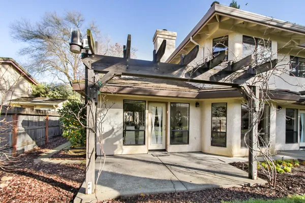a view of a house with a tree