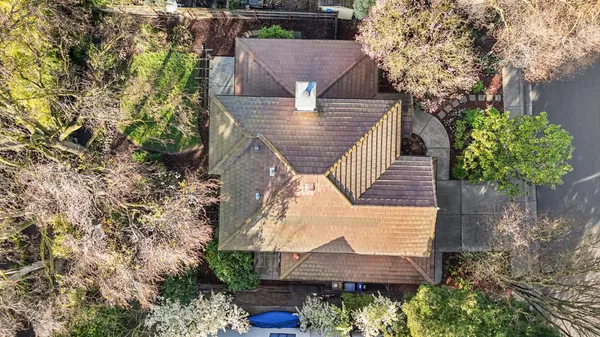an aerial view of residential house with an outdoor space