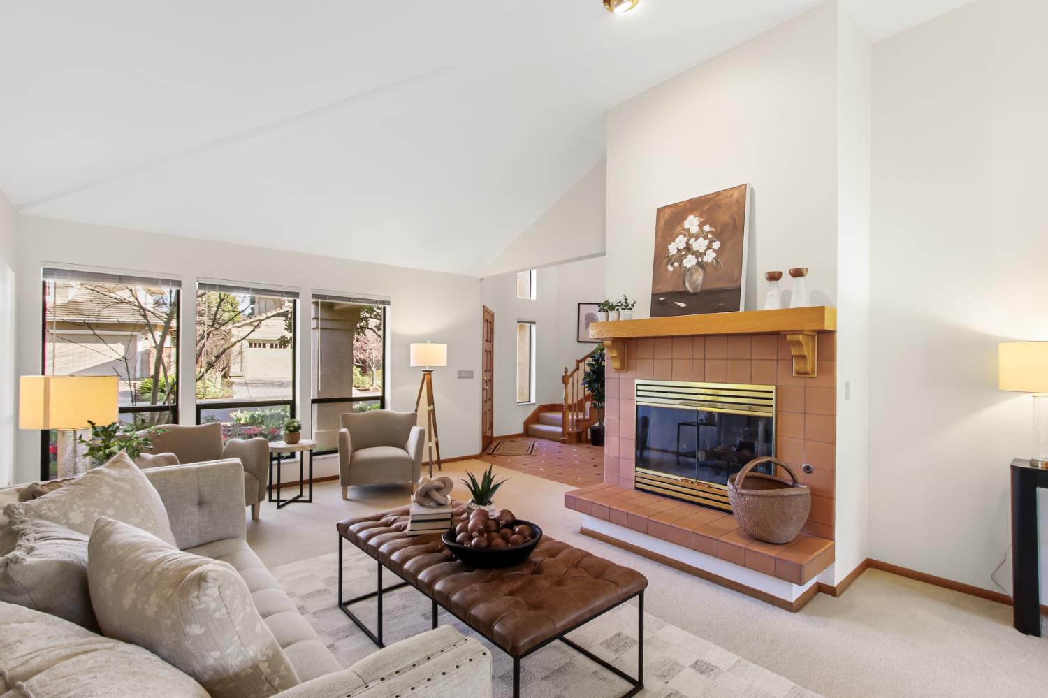 2216 Bryce Lane Davis, CA 95616 - Photo 7 of 53 a living room with furniture and a fireplace