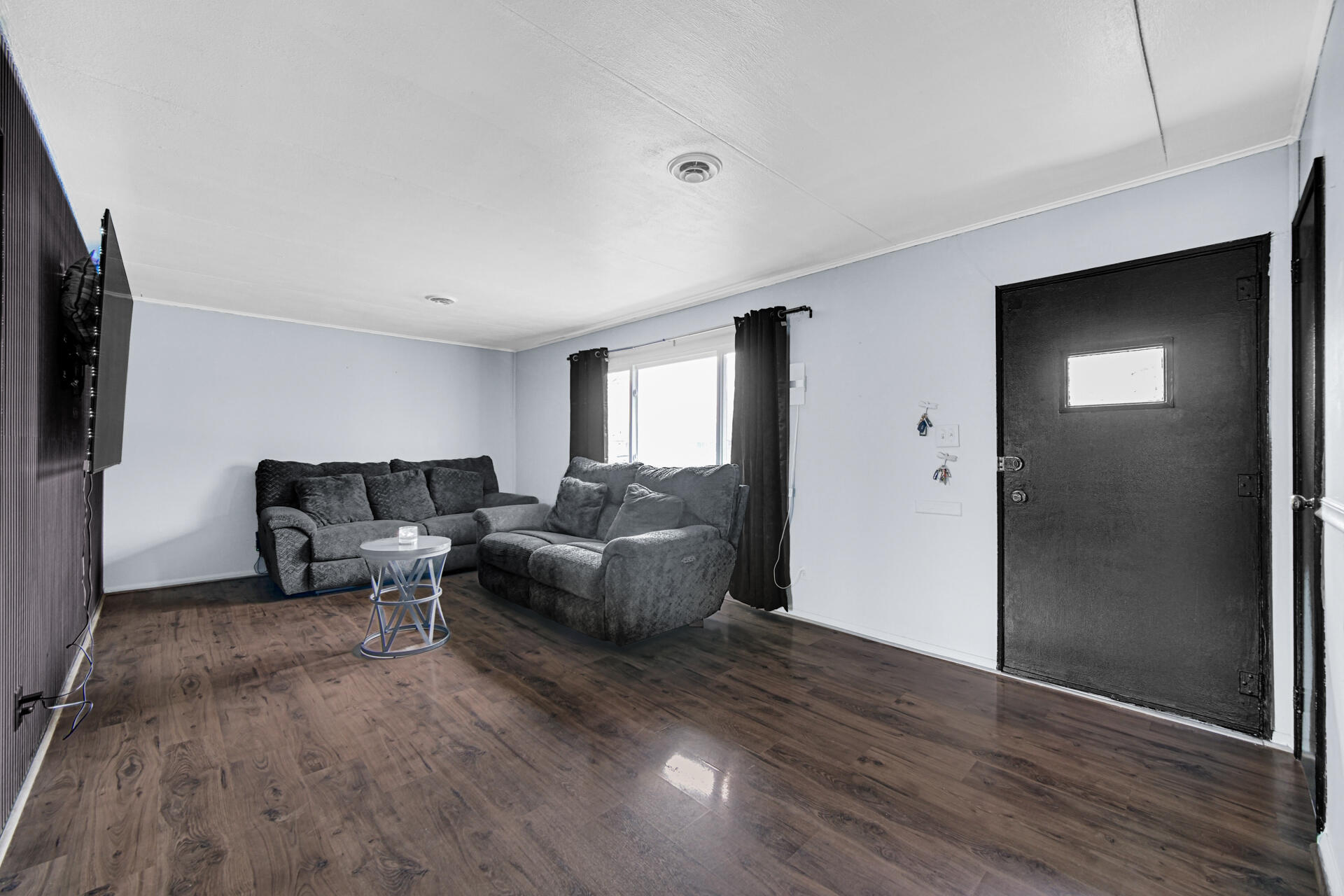 1639 174th Street Hammond, IN 46324 - Photo 6 of 21 a living room with furniture and a flat screen tv