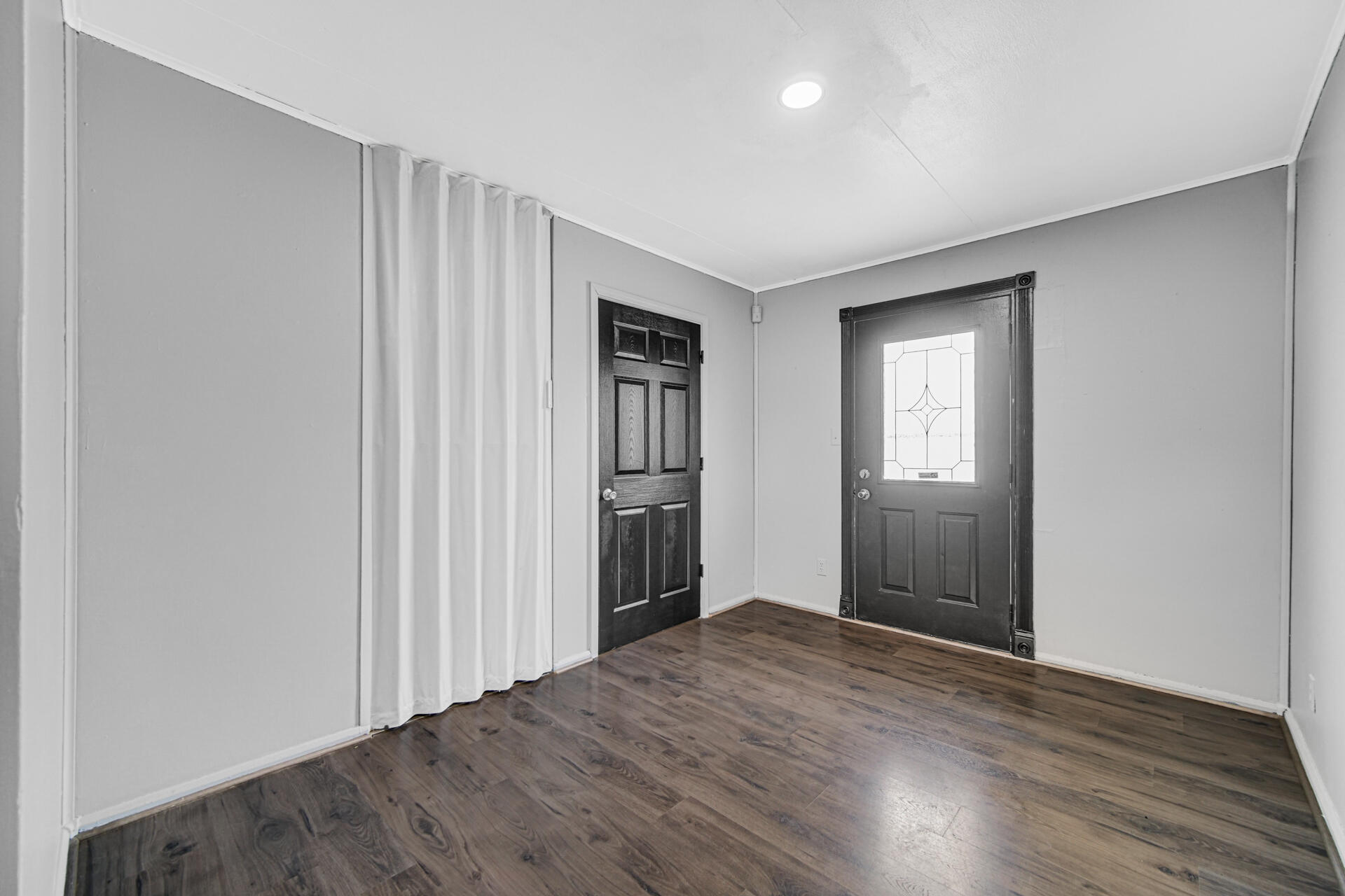 1639 174th Street Hammond, IN 46324 - Photo 8 of 21 an empty room with wooden floor and closet area