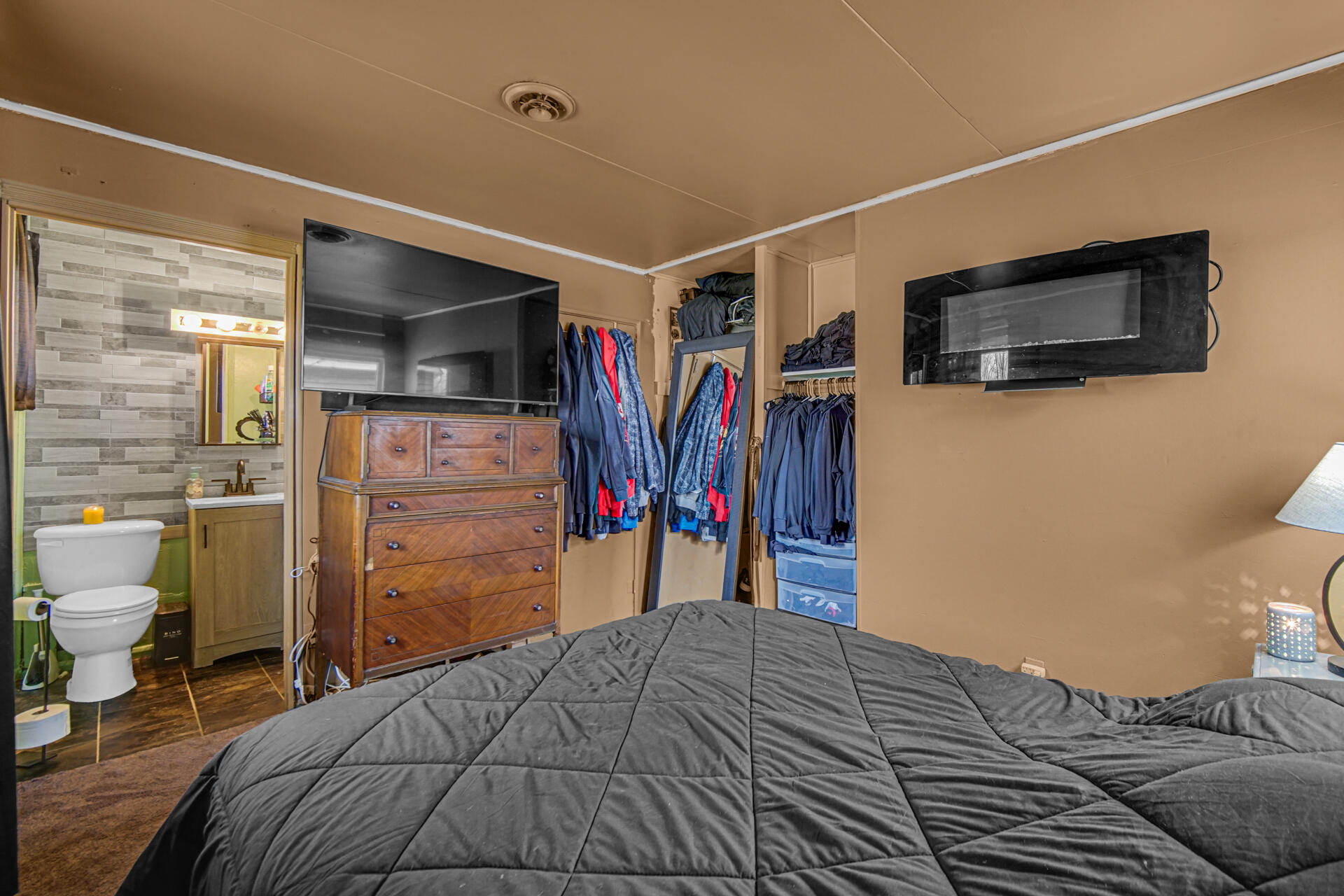 1639 174th Street Hammond, IN 46324 - Photo 10 of 21 a bed room with a bed and a television