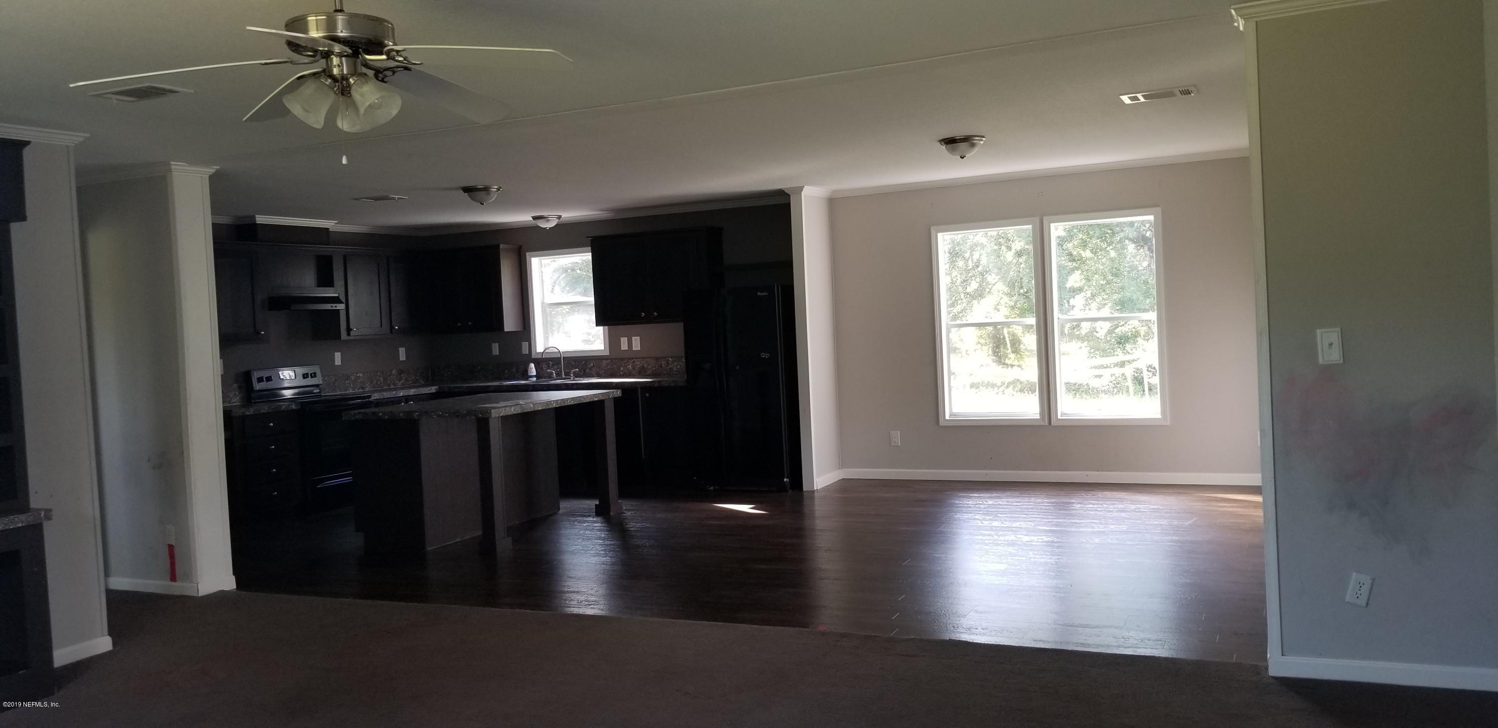 1360 Howard Road Jacksonville, FL 32218 - Photo 4 of 9 Living, Dining