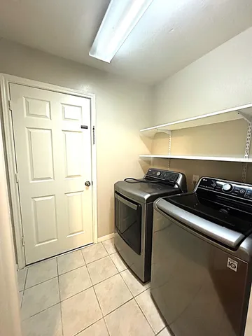 a close view of a sink and a stove in a room