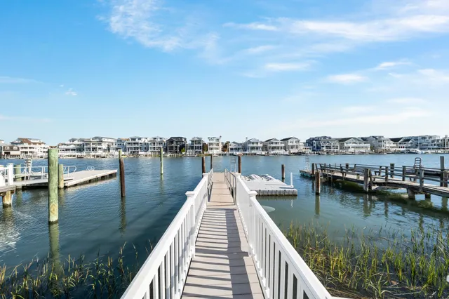 a living room with fireplace furniture and a flat screen tv