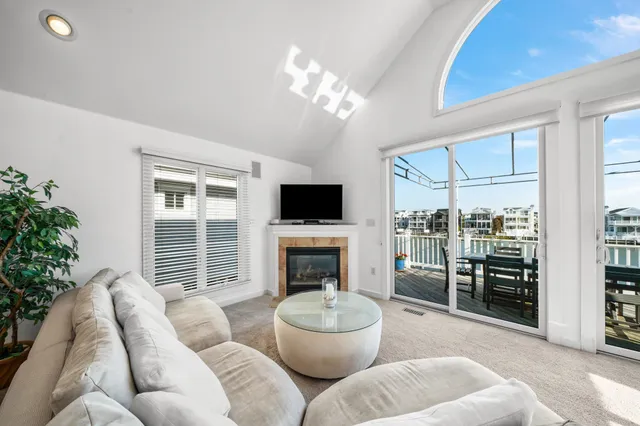 a view of a balcony with wooden floor