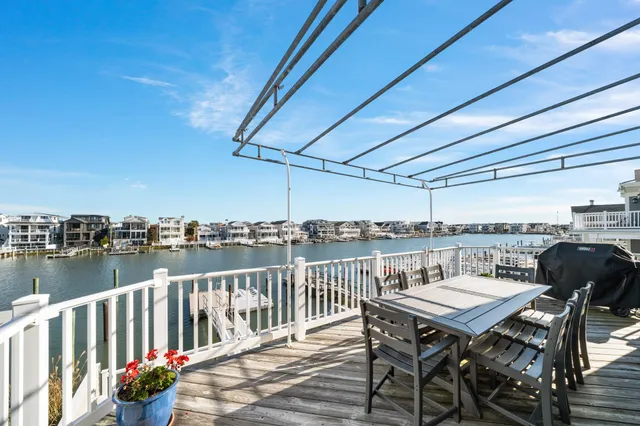 a bed room with a bed mirror and a window