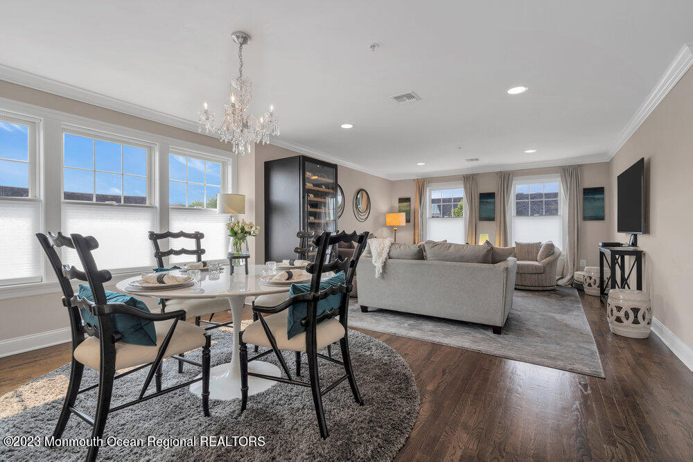 308 Morris Avenue, Unit A Spring Lake, NJ 07762 - Photo 11 of 37 a view of a dining room with furniture window and wooden floor