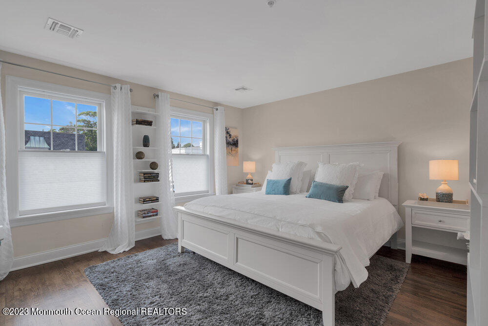 308 Morris Avenue, Unit A Spring Lake, NJ 07762 - Photo 17 of 37 a bedroom with a bed and a view of kitchen