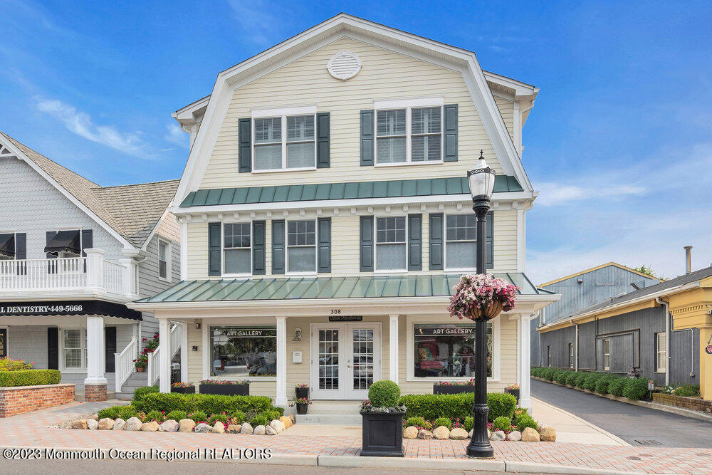308 Morris Avenue, Unit A Spring Lake, NJ 07762 - Photo 2 of 37 a front view of a house with garden