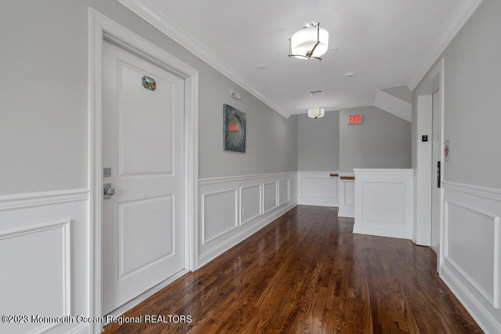 308 Morris Avenue, Unit A Spring Lake, NJ 07762 - Photo 25 of 37 a view of empty room with wooden floor
