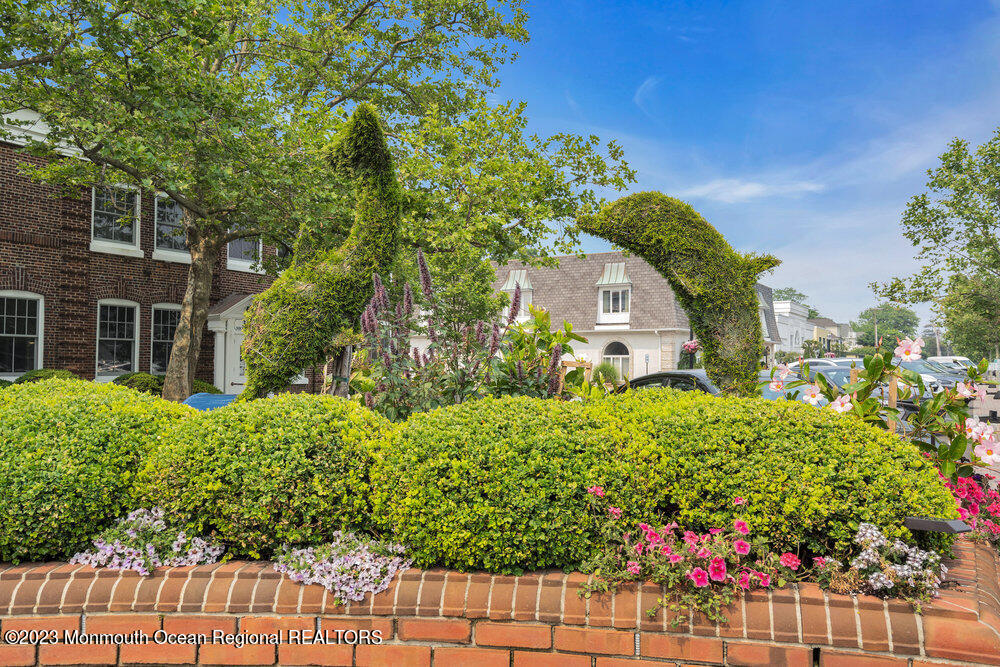 308 Morris Avenue, Unit A Spring Lake, NJ 07762 - Photo 27 of 37 a front view of a house with a yard