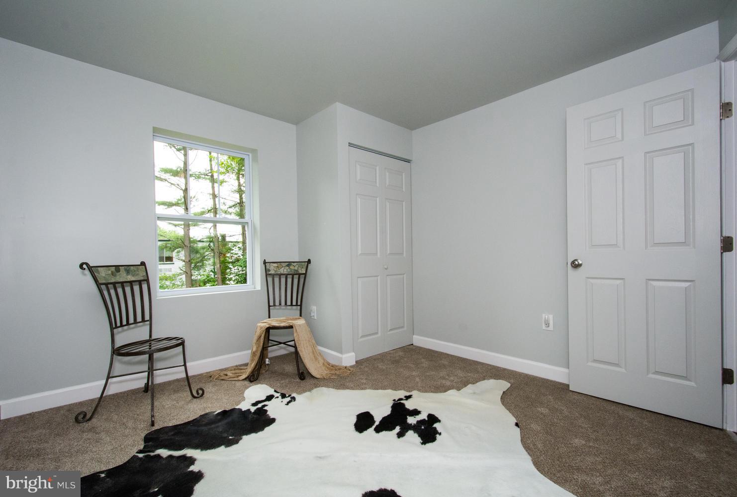 3504 Offutt Road Randallstown, MD 21133 - Photo 22 of 30 a living room with furniture and a window