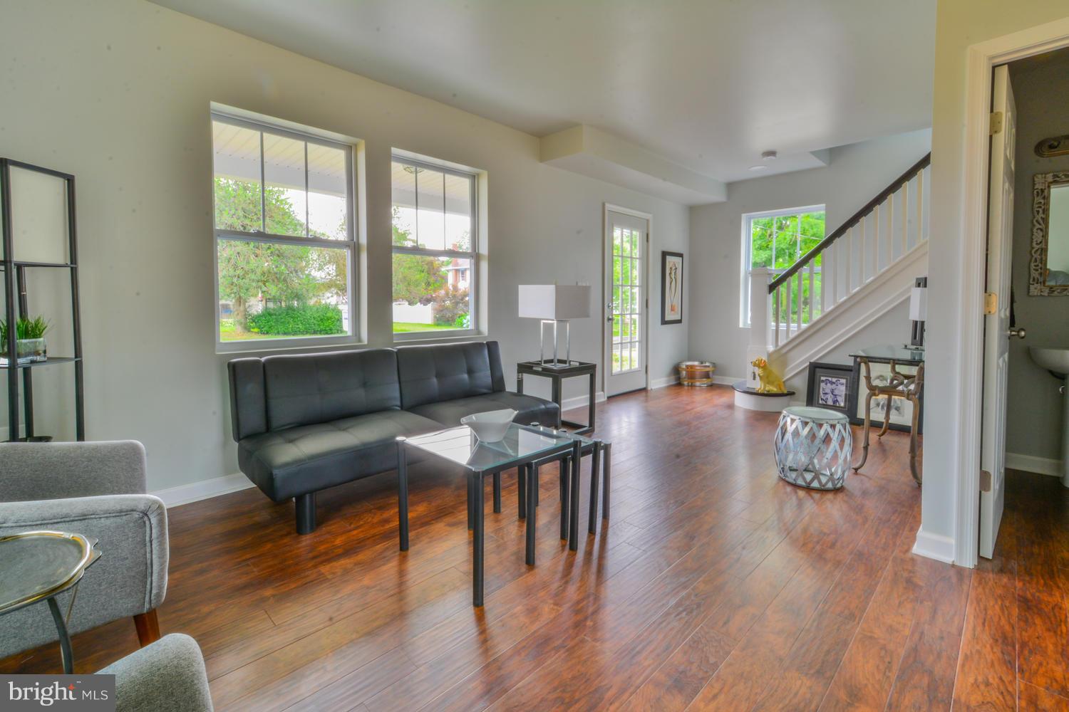 3504 Offutt Road Randallstown, MD 21133 - Photo 5 of 30 a living room with furniture and a wooden floor