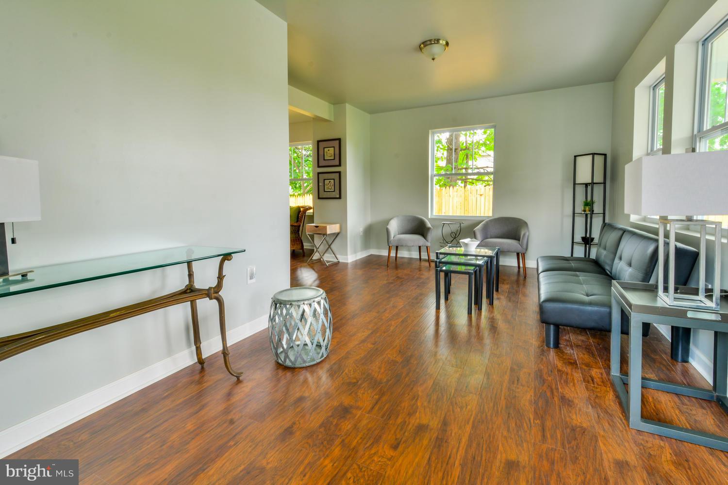 3504 Offutt Road Randallstown, MD 21133 - Photo 8 of 30 a living room with furniture and wooden floor