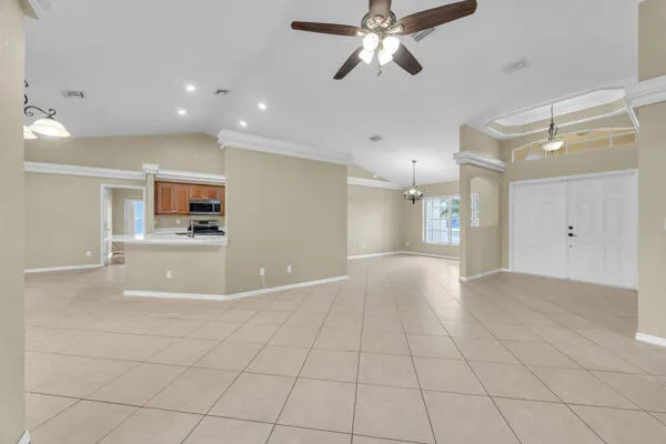 a view of a kitchen with a sink and a stove top oven
