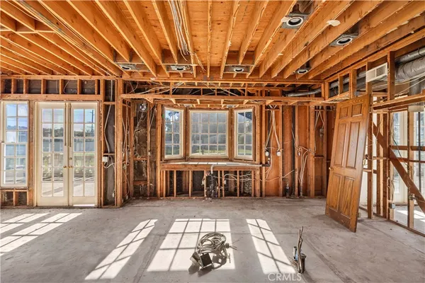 a view of a porch with furniture and shower