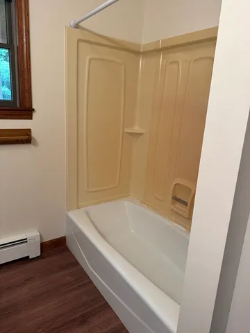 a bathroom with a bathtub