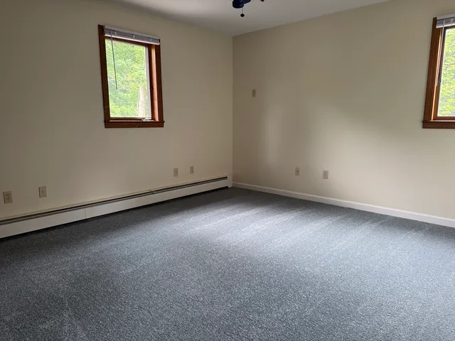 an empty room with windows