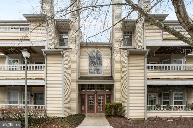 a view of a house with large windows