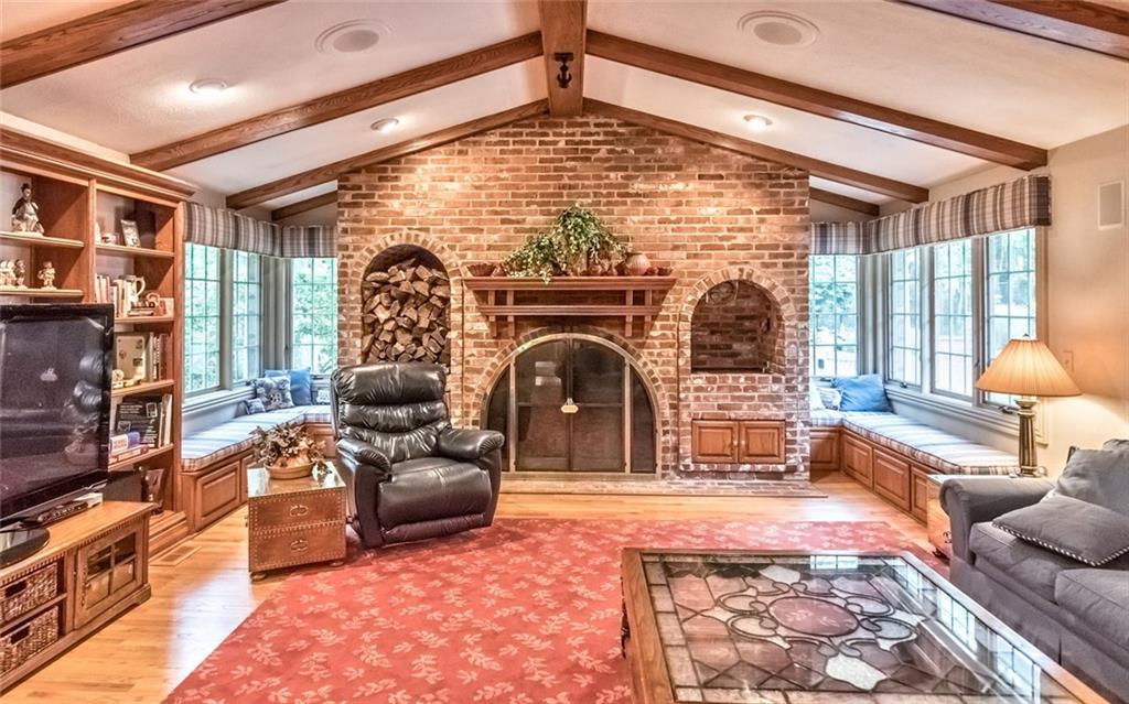 2390 Fairhill Road Sewickley, PA 15143 - Photo 13 of 25 Vaulted Beamed Ceiling Family Room with Custom Masonry Fireplace, Built-in Furniture & Hardwood Floors