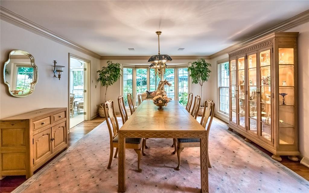 2390 Fairhill Road Sewickley, PA 15143 - Photo 8 of 25 Formal Bayed Dining Room with Hardwood Floors easily accommodating family gatherings or fine dinner parties