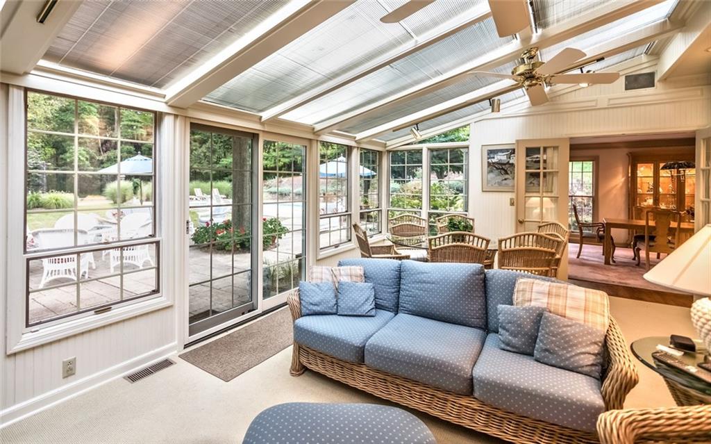 2390 Fairhill Road Sewickley, PA 15143 - Photo 10 of 25 4-Season Vaulted Ceiling Solarium Sunroom with 2 Ceiling Fans, Walls of Picture Windows & Glass Doors to the Rear Patio