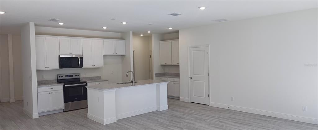 75 Kankakee Trail Palm Coast, FL 32164 - Photo 3 of 11 a view of a kitchen with electric appliances