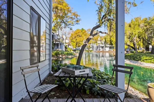 a view of chair and tables in the patio