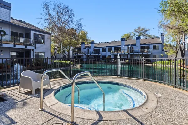 a view of a patio with swimming pool