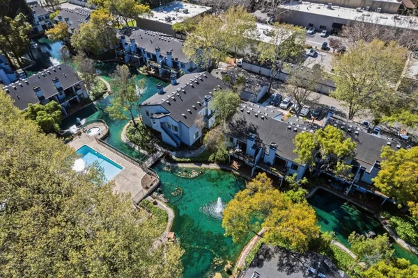an aerial view of residential house with outdoor space