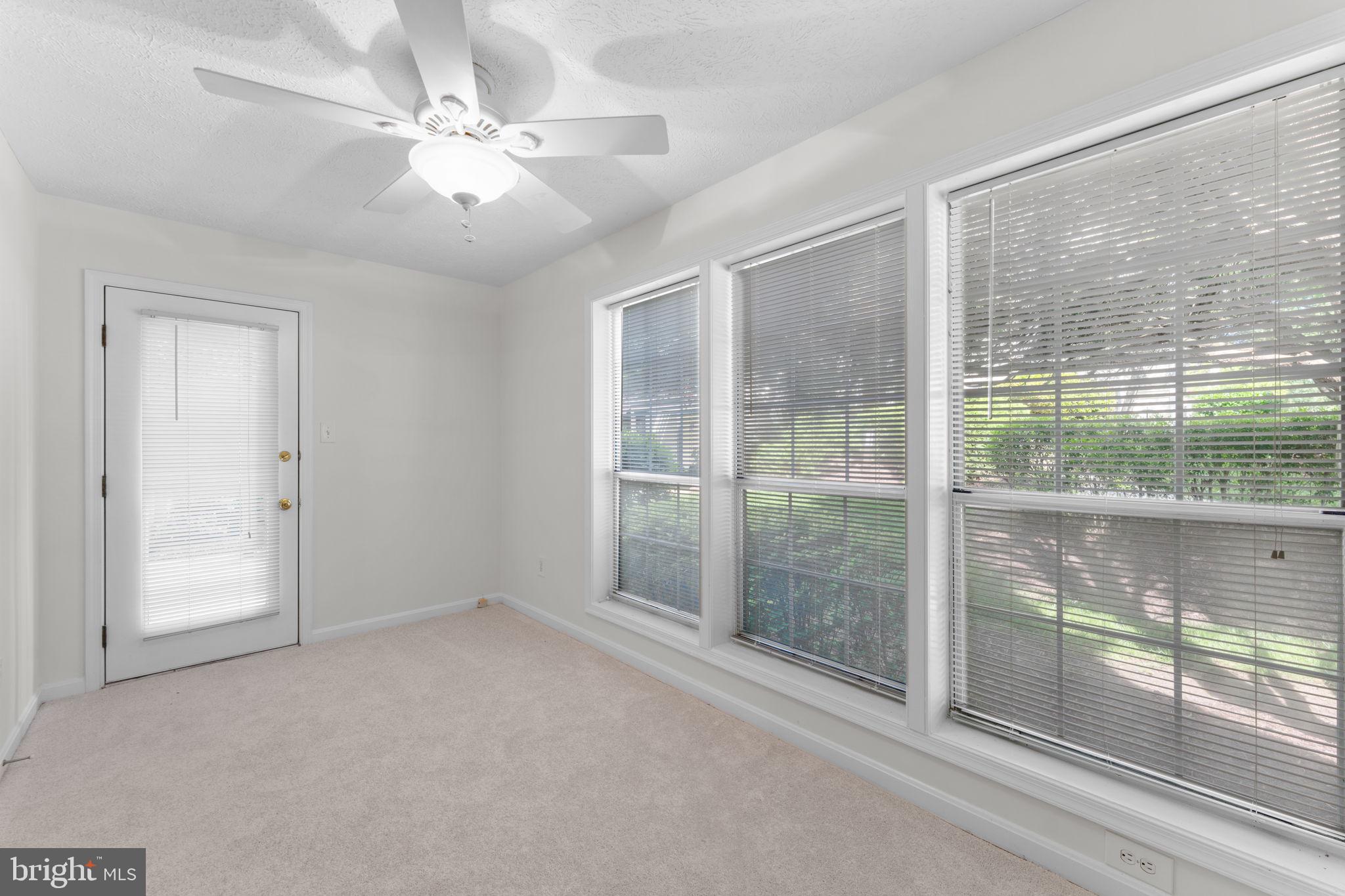 10013 Oakton Terrace Road Oakton, VA 22124 - Photo 36 of 52 Bright sunroom overlooking patio