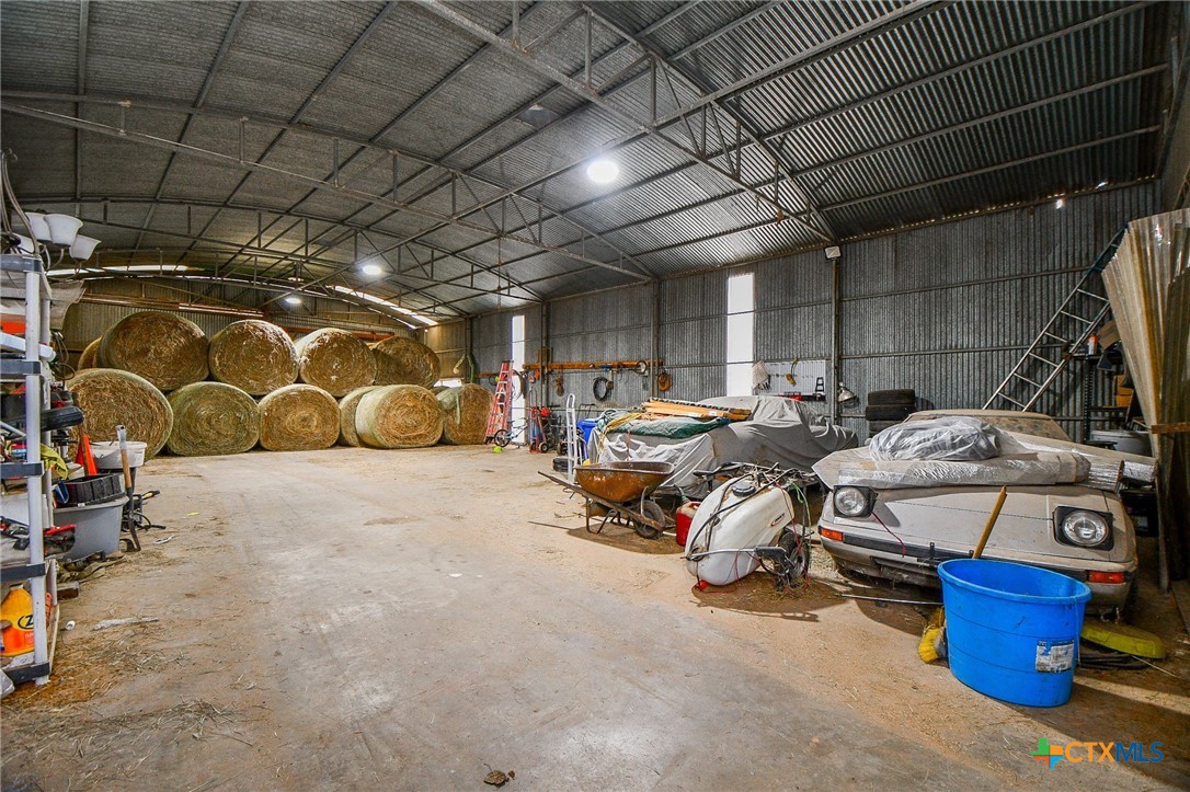 1093 Sunderman Road Alleyton, TX 78935 - Photo 12 of 48 a view of parking garage with cars