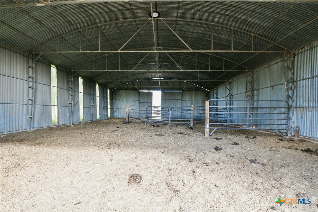 1093 Sunderman Road Alleyton, TX 78935 - Photo 14 of 48 a view of a room with wooden walls