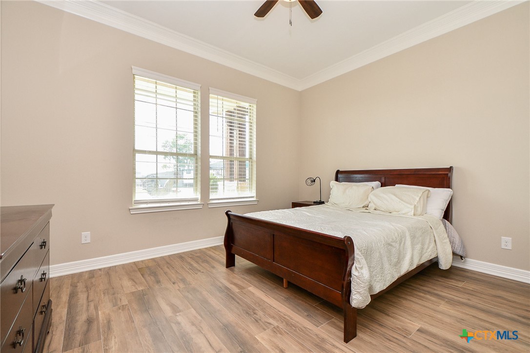 1093 Sunderman Road Alleyton, TX 78935 - Photo 31 of 48 a bedroom with a bed and window